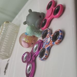 I'm selling three digit spinners and 2 squishys an
